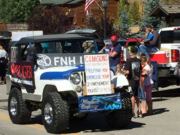 A thumb nail view of Grand Lake, Colorado during Constitution Week in September looking at the C & M Guns Jeep supporting our 2nd Amendment; click here to open a window with a larger picture.